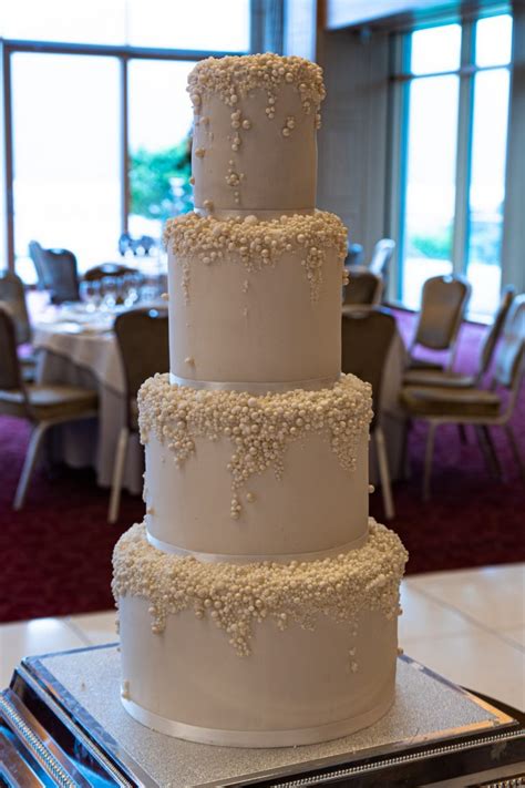 White Wedding Cake With Pearl Decorations Gabi Bakes Cakes