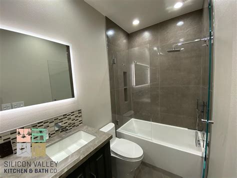 The bathroom disappears simply an area for one's individual hygiene. Small bathroom remodel- double sink vanity, toilet, and ...