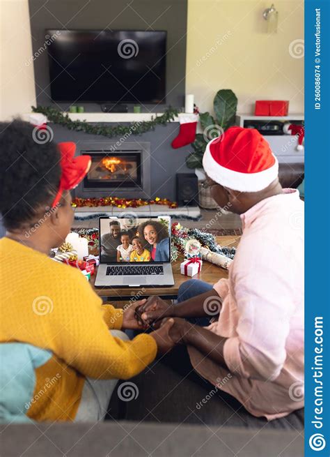 Senior African American Couple Having Christmas Video Call With African
