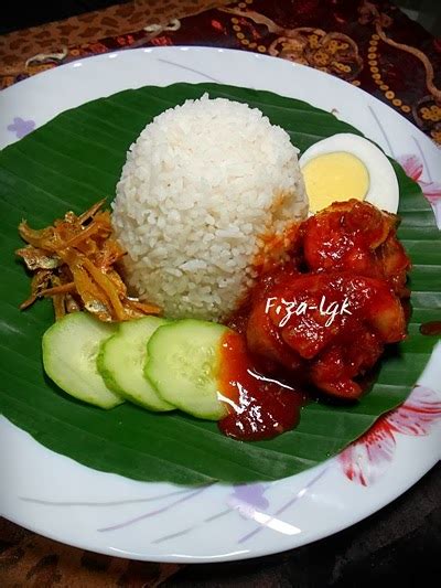 Sambal nasi lemak is made of ground red chilli, ginger and garlic which is then added to chopped shallots or sliced onions which has been fried to golden but, 9 out of 10 nasi lemak lovers would add a side or two for more satisfaction; NASI LEMAK SAMBAL AYAM | Fiza's Cooking