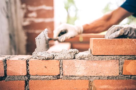 How Much Does It Cost To Build A Brick Or Stone Wall