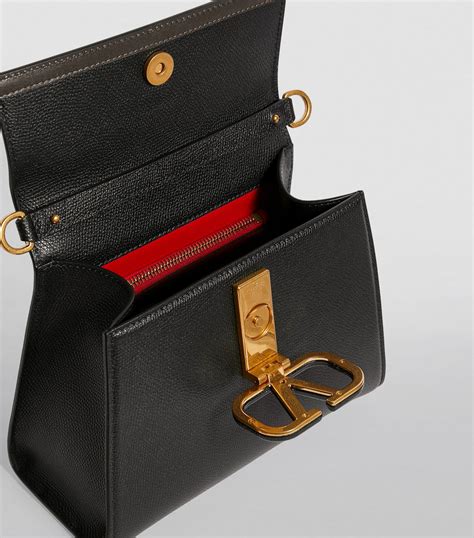 Valentino Black Valentino Garavani Small Leather Vsling Top Handle Bag