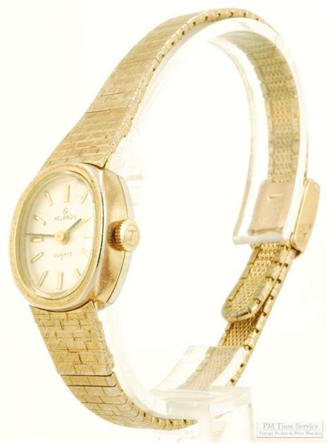 Helbros Quartz Ladies Wrist Watch Elegant Gold Tone Gem