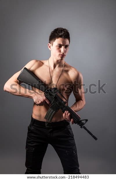 Handsome Barechested Soldier Holding Rifle On Stock Photo 218494483