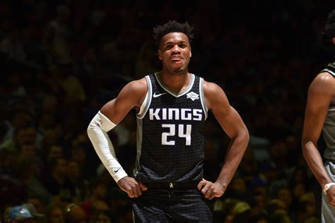Download Buddy Hield Smiling In Court Wallpaper