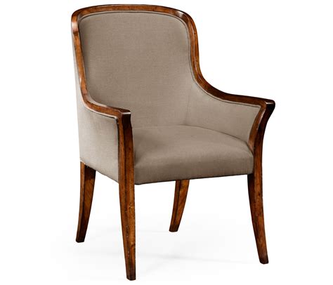 Revel in the whispered opulence of the arise dining armchair. Low curved back upholstered dining armchair