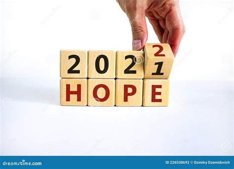 2022 Hope New Year Symbol Businessman Turns A Wooden Cube And Changes