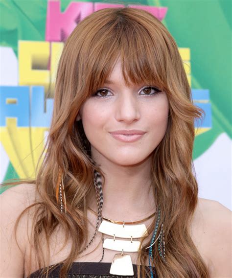 Bella Thorne Long Wavy Casual Hairstyle With Blunt Cut Bangs Red Hair