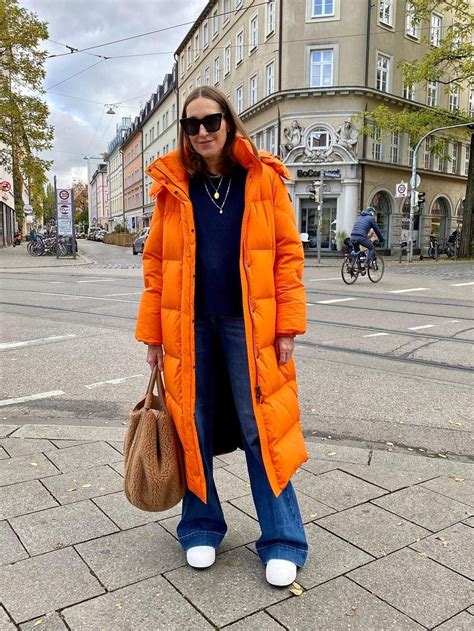 How To Wear Orange Coat Orange Coat Street Styles Melody Jacob