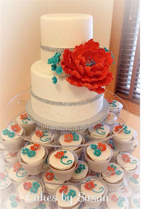 Coral And Turquoise Wedding Cake With Matching Cupcakes