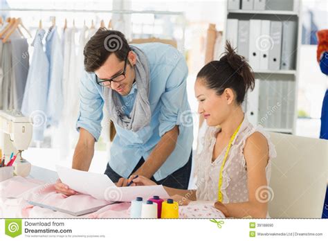 Fashion Designers At Work In Bright Studio Stock Photo Image Of Male