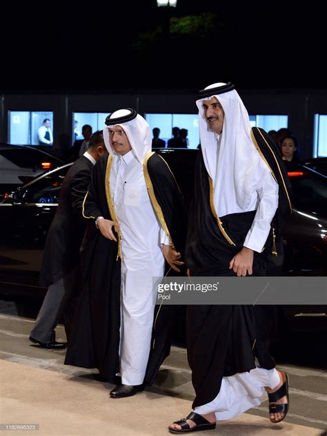 Sheikh Tamim Bin Hamad Al Thani Of Qatar R Arrives To Attend The