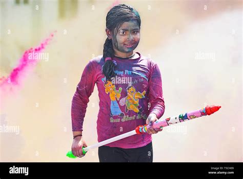 Girl Playing Holi Pichkari Hi Res Stock Photography And Images Alamy