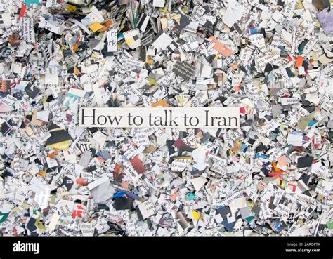 Newspaper Confetti From Above With The Words How Ti Talk To Iran