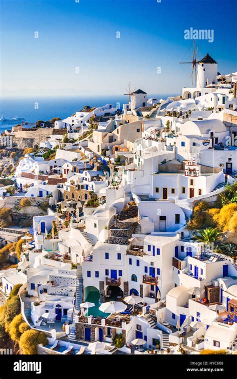 Santorini Greece Oia City With White And Blue Houses In Aegean Sea