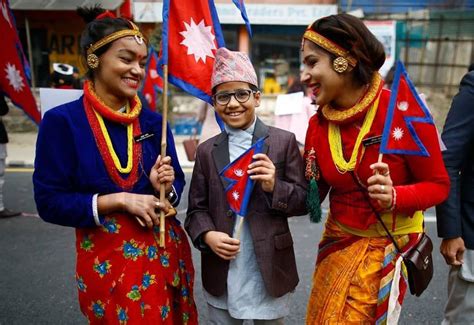 nepali people dressed in national attires take part in a rally to celebrate national dress day
