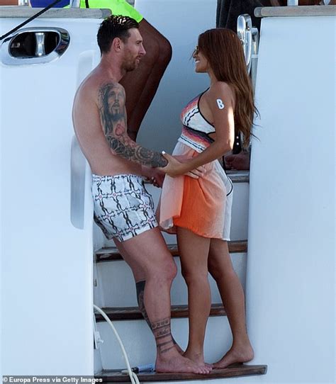 lionel messi enjoys a private moment with stunning wife antonella roccuzzo daily mail online