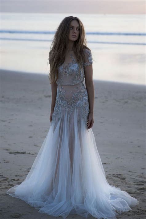 This casual beach chic wedding ceremony beckons the romantic aura that paradise has to offer. Bohemian Wedding Dresses for Stylish Brides - MODwedding