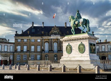 Amalienborg And Statue Of Frederick V In Copenhagen Denmark Stock