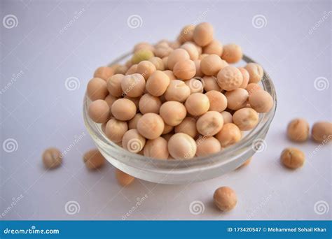 White Pees In A Glass Bowl On White Background Close Up Stock