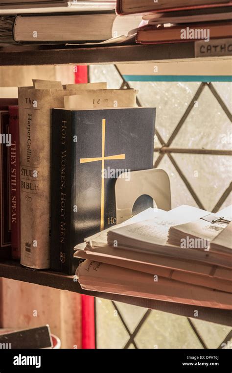 Bible On Book Shelf With Window Stock Photo Alamy