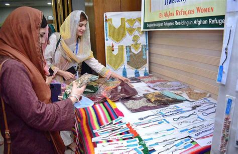 Visitors Taking Keen Interest In Handmade Items Displayed At Stalls By