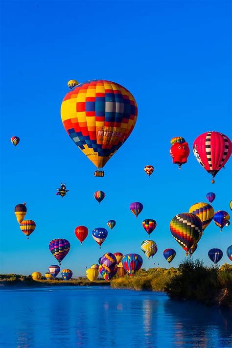 Hot Air Balloons Flying Low Over The Rio Grande River Just After