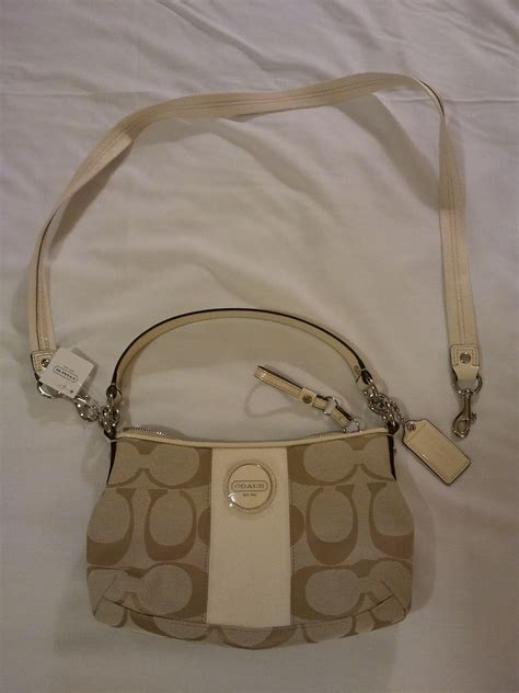 Awesome sling or side bag for men or women. fabulously yours: Coach Signature Sling bag