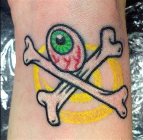Eyeball And Crossbones Tattoo By Coop Tattoos Fish Tattoos Crossbones