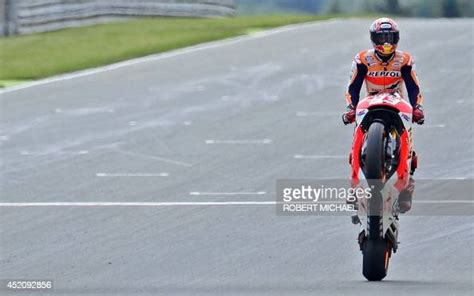Honda Rider Marc Marquez Of Spain Pulls A Wheelie After Winning The