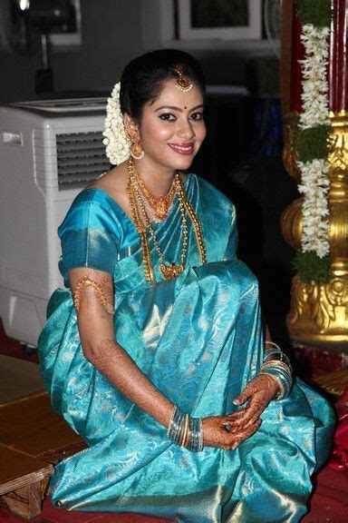 south indian bride in a sky blue silk saree