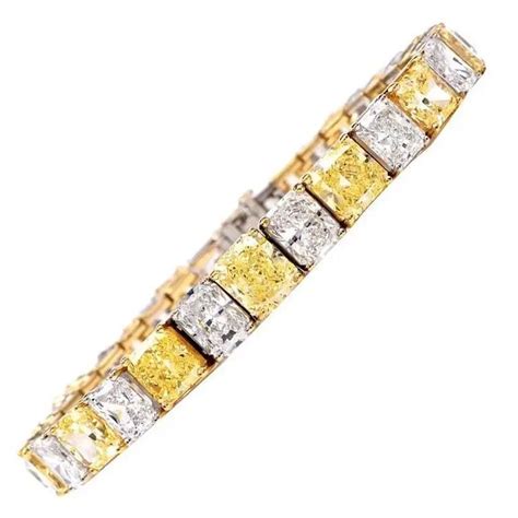 Natural Fancy Vivid Yellow And Extra White Diamond Platinum Gold