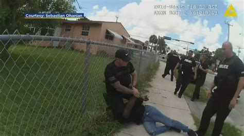 Newly Released Bodycam Appears To Show Miami Dade Officer Kneeling On Suspect Yelling I Cant