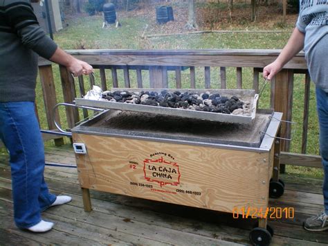 Maybe you would like to learn more about one of these? Pig Roast with the La Caja China - TKD Recipes | Men in the Kitchen