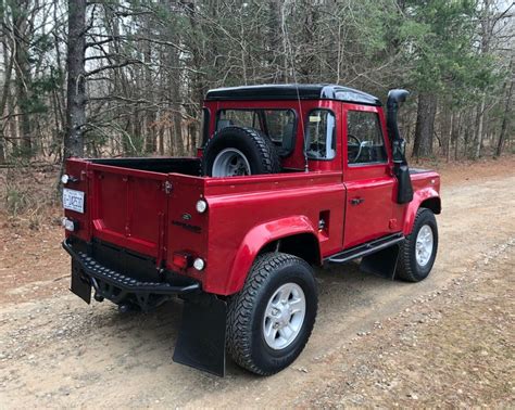 Take a look at our land rover defender catalogue. 1990 Land Rover Defender 90 - Pick Up Truck - 200Tdi - Red ...
