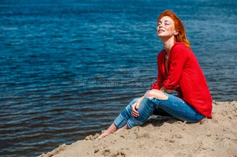 Young Beautiful Redhead Woman Sitting At The Beach Stock Image Image
