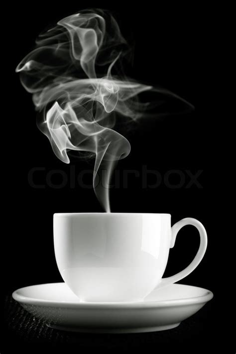 Coffee Cup Over The Table Against Black Background Stock