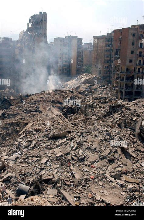 Collapsed Apartment Buildings Are Seen In The Hezbollah Stronghold Of The Southern Suburbs Of