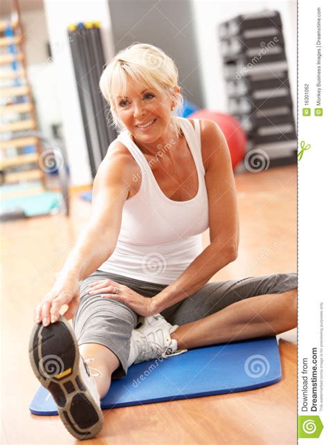 Senior Woman Doing Stretching Exercises Stock Photo Image Of Seniors
