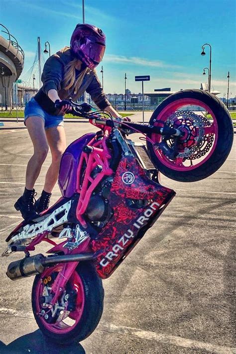 stunt girl on her dreamy pink kawasaki modifiedx
