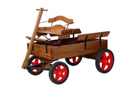An Old Fashioned Wooden Wagon With Red Wheels