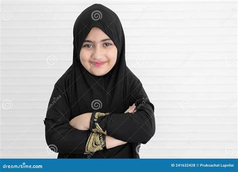 Little Asian Pakistani Muslim Girl Wearing Black Hijab With Beautiful Eyes Is Smiling And
