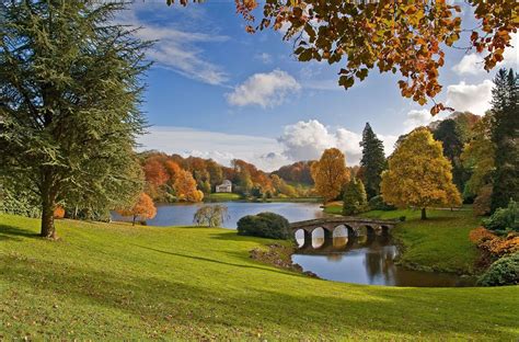 England is located on the island of great britain, which lies to the west of the main continent of europe. Stourhead Garden autumn trees England Wiltshire Wiltsie ...