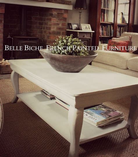 It has a smooth, laminate top and black metal, open frame legs. Rustic Style Gustavian Grey Coffee Table | Belle Biche ...