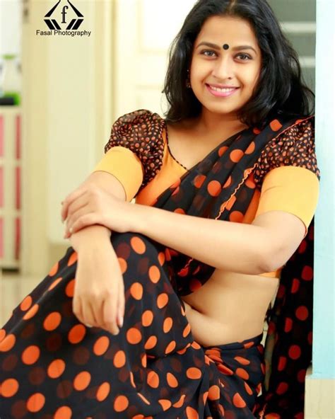 The Fresh Malayali Malayalam Serial Actress Sadhika Venugopal Latest Hot Photoshoot Saree Navel
