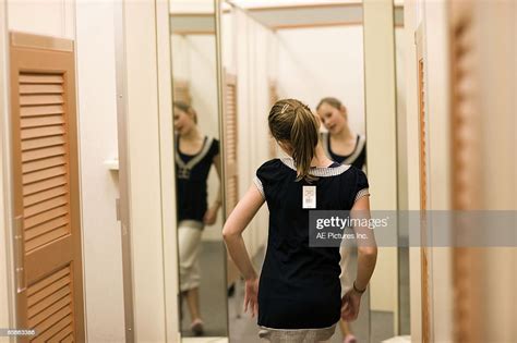 Tween Girl In Dressing Room Of Store Photo Getty Images