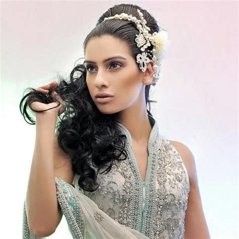 Basically, the top half of the hair is formed in a basic beehive, but the back is left down and filled with soft curls. 18 Wedding Hairstyles You Must Have - Pretty Designs