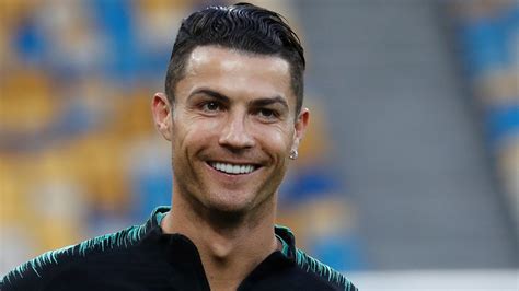 Cristiano Ronaldo Is Wearing Black Blue Sports Dress Standing In Blur
