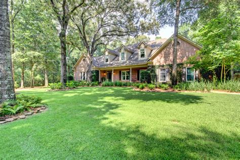Simply amazing customized southern living plan home with barn sits in 20 acres of rolling hills conveniently located in daphne. Luxury Daphne Alabama Real Estate For Sale