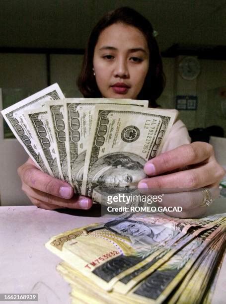 Philippine Peso To Us Dollars Photos And Premium High Res Pictures Getty Images